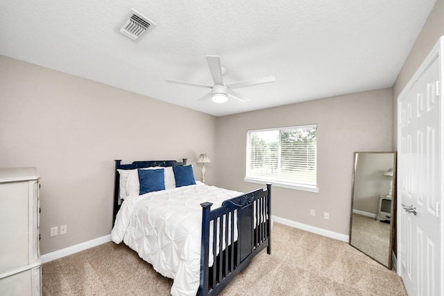 1140 Bartlett Rd, Katy, TX 77493 - bedroom featuring light carpet, baseboards, and ceiling fan