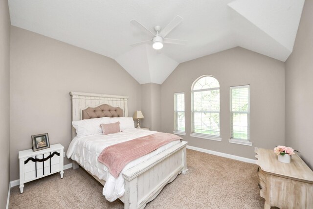 1140 Bartlett Rd, Katy, TX 77493 - bedroom with light carpet, baseboards, a ceiling fan, and vaulted ceiling
