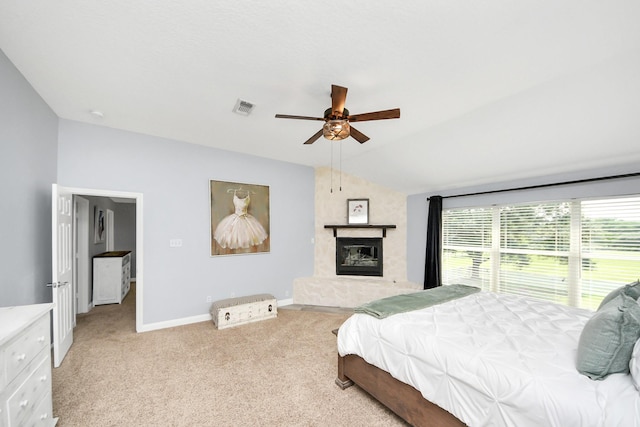 1140 Bartlett Rd, Katy, TX 77493 - bedroom featuring vaulted ceiling, light colored carpet, a fireplace, baseboards, and a ceiling fan