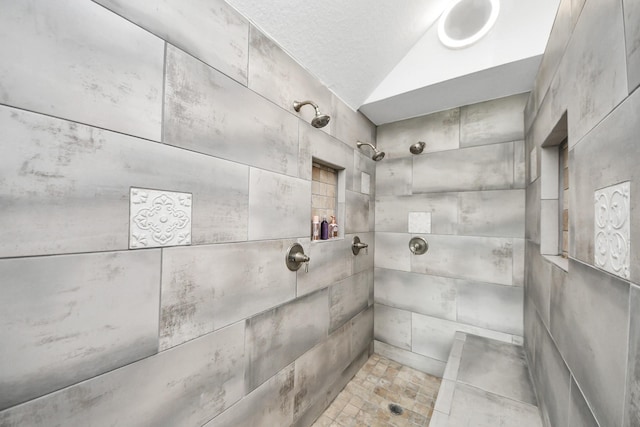1140 Bartlett Rd, Katy, TX 77493 - bathroom with tiled shower and lofted ceiling