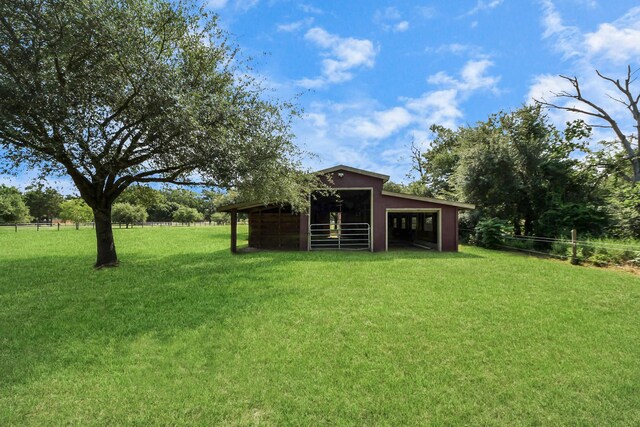 1140 Bartlett Rd, Katy, TX 77493 - view of yard with a pole building and an outdoor structure