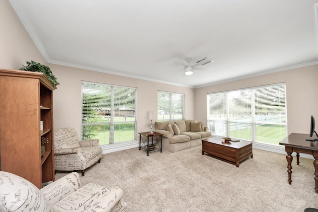 1140 Bartlett Rd, Katy, TX 77493 - carpeted living room featuring a ceiling fan and ornamental molding