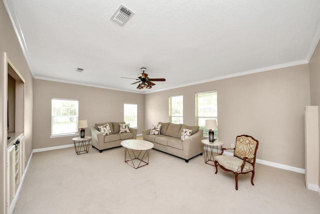 1140 Bartlett Rd, Katy, TX 77493 - living area with crown molding, baseboards, light carpet, and ceiling fan