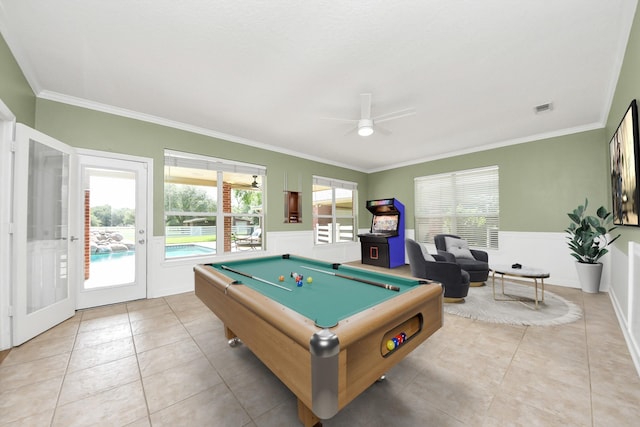 1140 Bartlett Rd, Katy, TX 77493 - recreation room with ornamental molding, billiards table, light tile patterned floors, ceiling fan, and a wainscoted wall