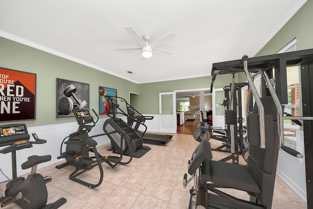 1140 Bartlett Rd, Katy, TX 77493 - workout area featuring crown molding, ceiling fan, tile patterned floors, and wainscoting