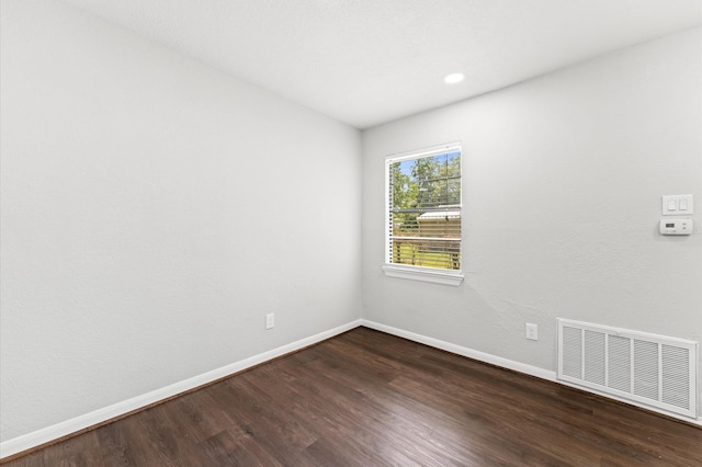13430 Orleans St, Houston, TX 77015 - unfurnished room featuring baseboards, dark wood-style flooring, and recessed lighting