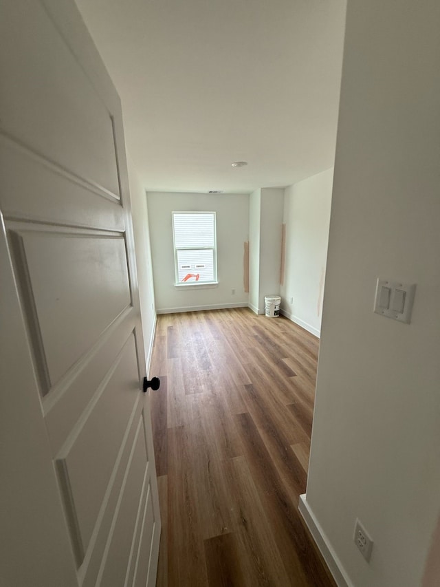 8019 Birmingham St, Houston, TX 77028 - corridor with wood finished floors and baseboards