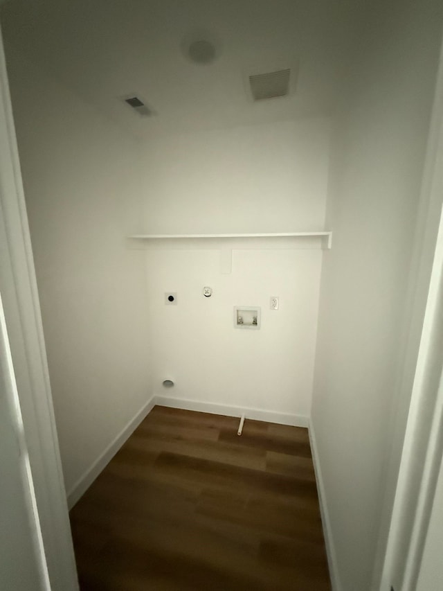 8019 Birmingham St, Houston, TX 77028 - washroom with electric dryer hookup, wood finished floors, washer hookup, and baseboards