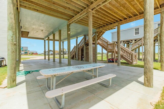 2176 Hwy 87, Gilchrist, TX 77617 - view of patio featuring stairs