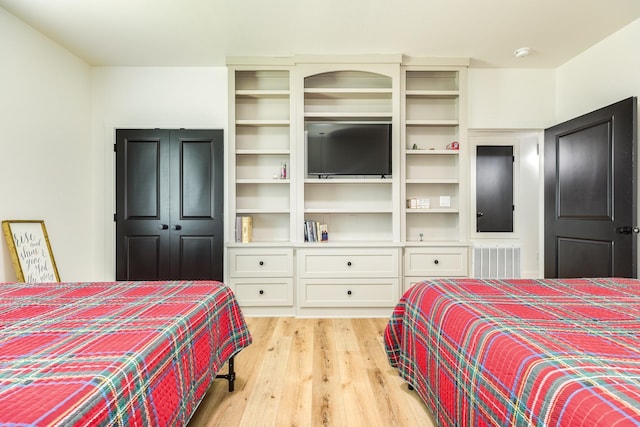 2176 Hwy 87, Gilchrist, TX 77617 - bedroom with light wood-style flooring