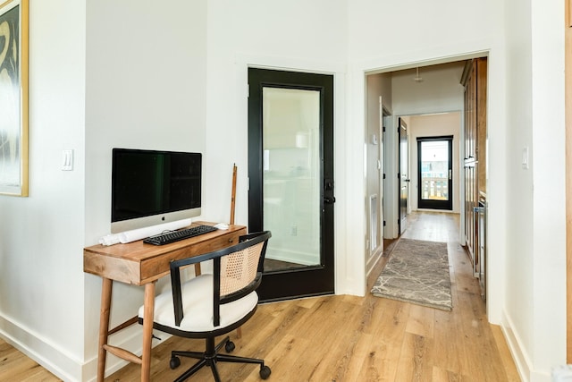 2176 Hwy 87, Gilchrist, TX 77617 - office area with light wood-style floors and baseboards
