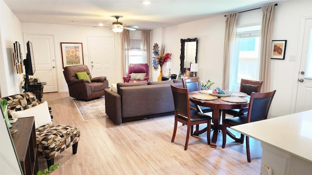 20822 Masella Ridge Dr, New Caney, TX 77357 - dining space with light wood-type flooring and a ceiling fan