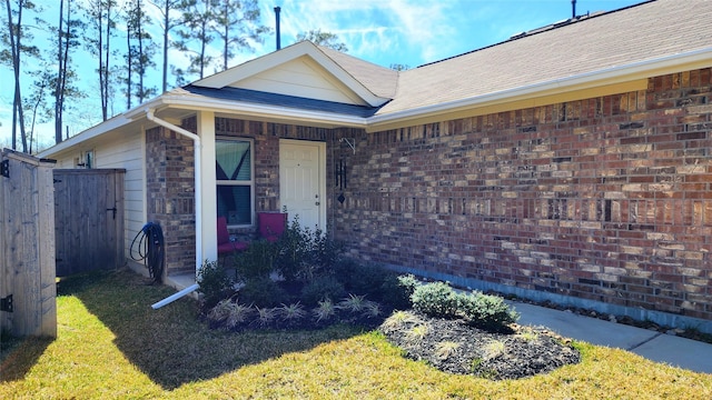 20822 Masella Ridge Dr, New Caney, TX 77357 - property entrance featuring brick siding and a shingled roof