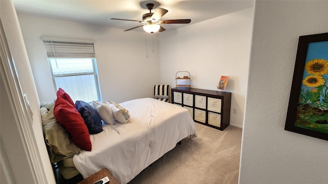 20822 Masella Ridge Dr, New Caney, TX 77357 - bedroom with light colored carpet and a ceiling fan