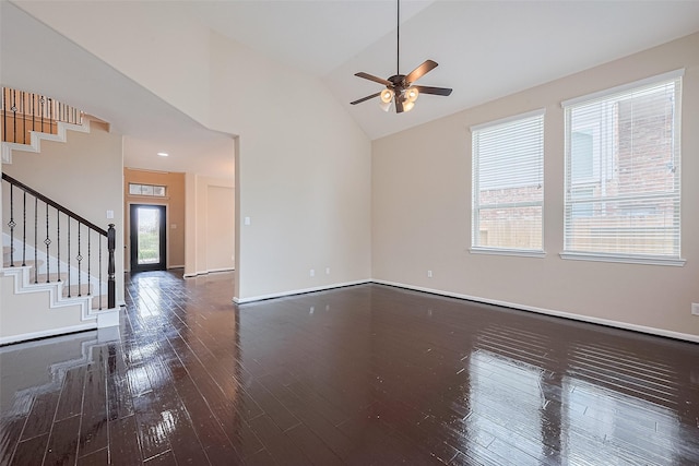 16747 Highland Country Dr, Cypress, TX 77433 - spare room featuring wood-type flooring, stairs, ceiling fan, and high vaulted ceiling
