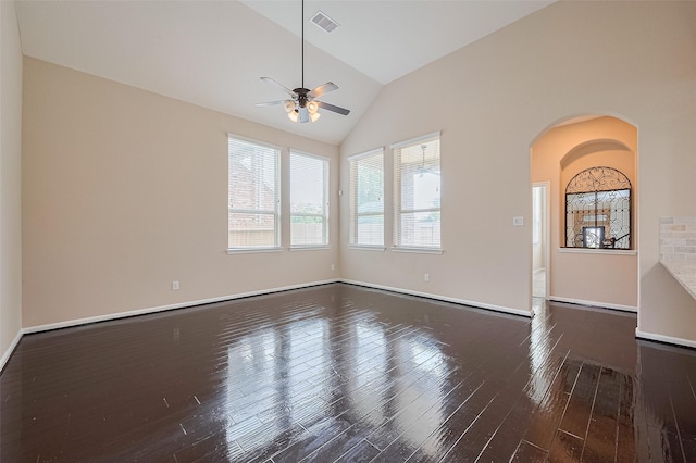 16747 Highland Country Dr, Cypress, TX 77433 - unfurnished room featuring arched walkways, a ceiling fan, vaulted ceiling, and wood finished floors