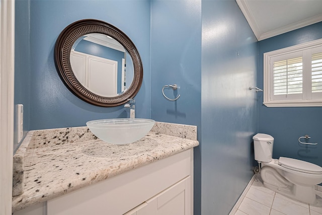 9647 Winsome Ln, Houston, TX 77063 - half bath with ornamental molding, tile patterned floors, vanity, toilet, and baseboards