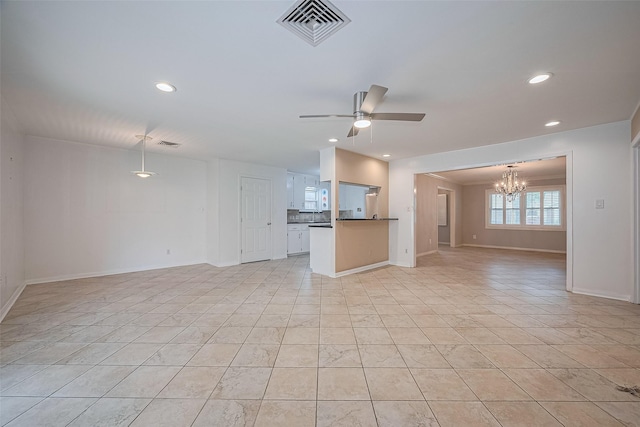 9647 Winsome Ln, Houston, TX 77063 - unfurnished living room featuring a chandelier, ceiling fan, baseboards, recessed lighting, and light tile patterned flooring