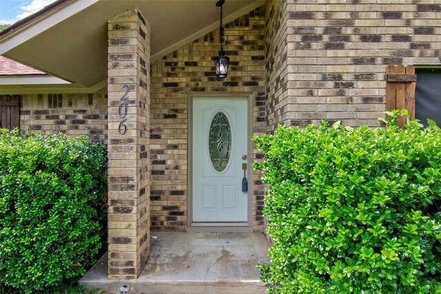 206 Verna St, Jasper, TX 75951 - property entrance featuring brick siding