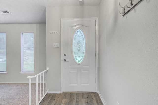 206 Verna St, Jasper, TX 75951 - entryway with baseboards and wood finished floors