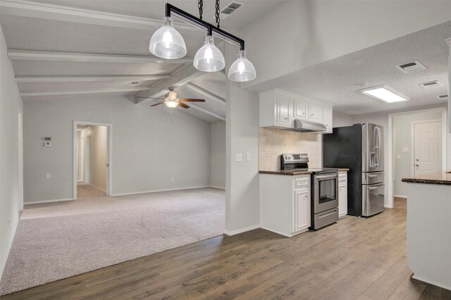 206 Verna St, Jasper, TX 75951 - kitchen with stainless steel appliances, white cabinets, wood finished floors, a ceiling fan, and baseboards