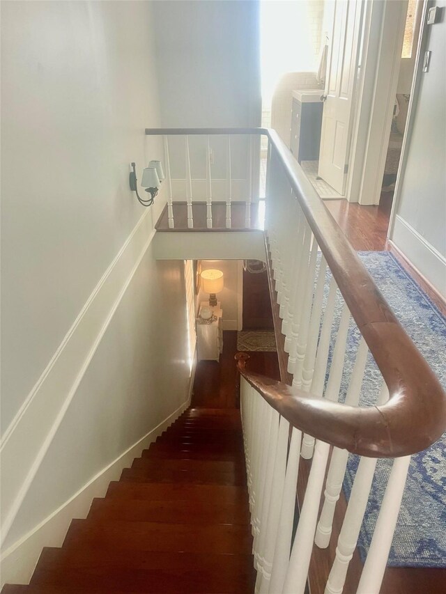 1717 Winnie St, Galveston, TX 77550 - stairway featuring wood finished floors and baseboards