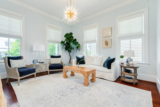 1717 Winnie St, Galveston, TX 77550 - living room with healthy amount of natural light, dark wood-style floors, a chandelier, ornamental molding, and baseboards