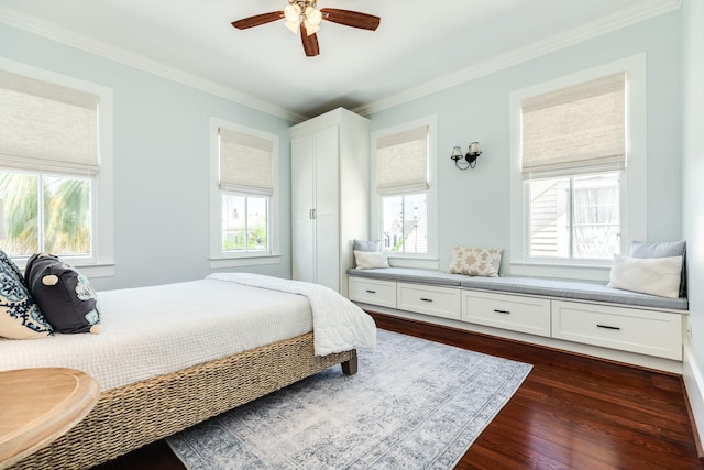 1717 Winnie St, Galveston, TX 77550 - bedroom featuring multiple windows, crown molding, dark wood-style flooring, and ceiling fan