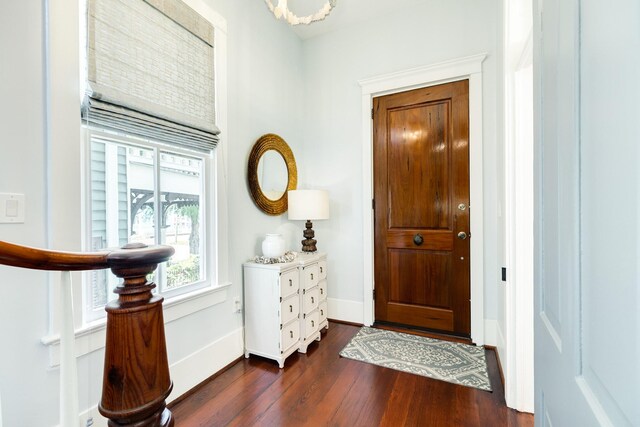 1717 Winnie St, Galveston, TX 77550 - foyer with dark wood-style flooring and baseboards