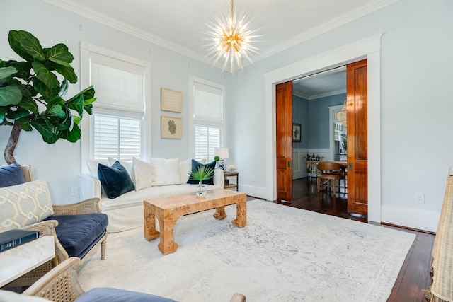 1717 Winnie St, Galveston, TX 77550 - living area with crown molding, a chandelier, dark wood-type flooring, and baseboards