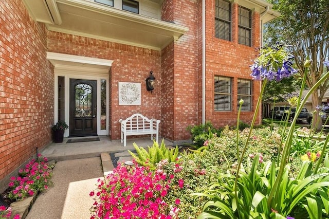 15106 Cranbourne Dr, Houston, TX 77062 - doorway to property with brick siding and a porch