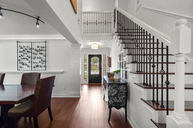15106 Cranbourne Dr, Houston, TX 77062 - entryway featuring hardwood / wood-style floors, stairway, and decorative columns