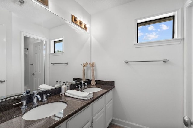 15106 Cranbourne Dr, Houston, TX 77062 - full bath with double vanity and baseboards