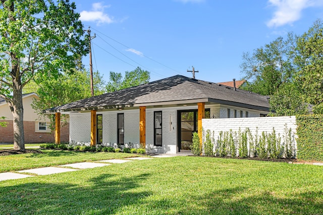 2506 Briarbrook Dr, Houston, TX 77042 - view of front of property with brick siding, a front lawn, and roof with shingles