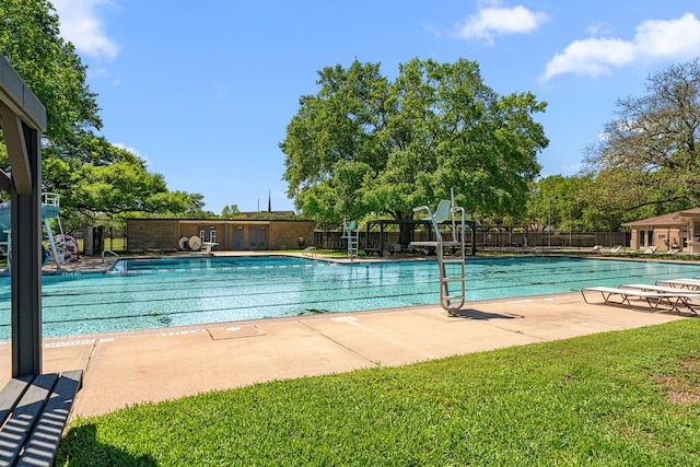 community pool with a patio