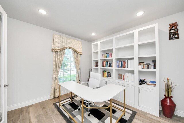 1935 Creekwood Cv, Missouri City, TX 77459 - office featuring light wood-style flooring, recessed lighting, and baseboards