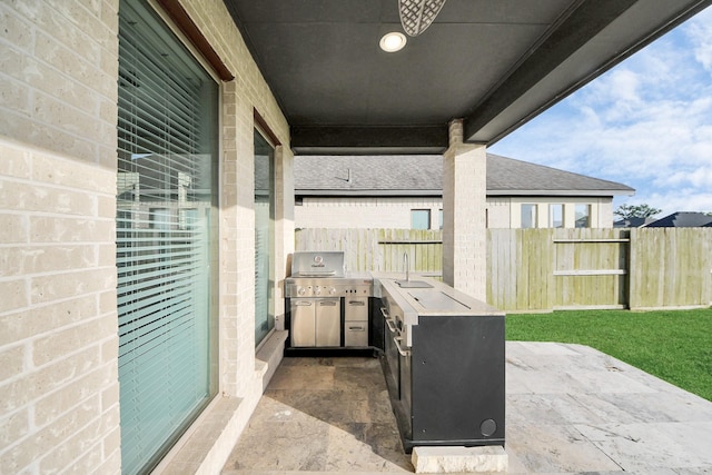 1935 Creekwood Cv, Missouri City, TX 77459 - view of patio featuring a sink and grilling area