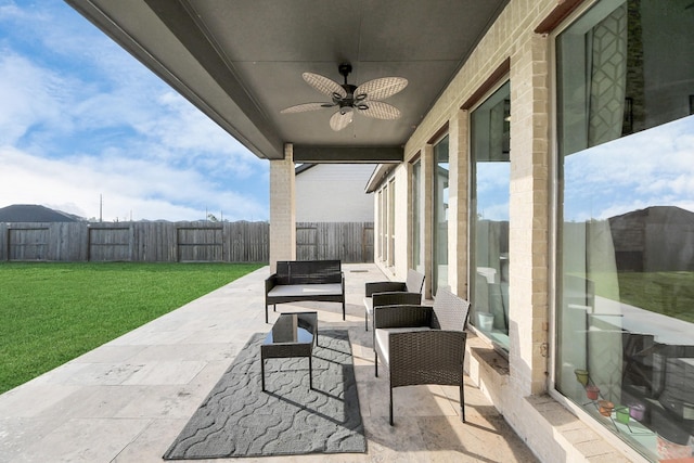 1935 Creekwood Cv, Missouri City, TX 77459 - view of patio / terrace featuring ceiling fan and an outdoor living space