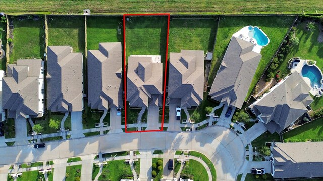1935 Creekwood Cv, Missouri City, TX 77459 - aerial perspective of suburban area featuring property parcel outlined and a pool area