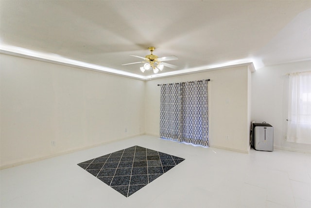 7900 Westheimer Rd Unit 246, Houston, TX 77063 - spare room with ceiling fan and tile patterned floors