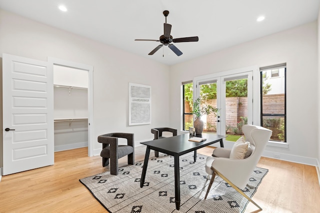 2621 Greenbriar Dr, Houston, TX 77098 - home office with light wood-style flooring, ceiling fan, baseboards, and recessed lighting