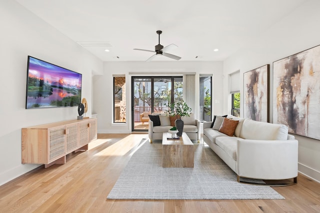 2621 Greenbriar Dr, Houston, TX 77098 - living area featuring light wood-style flooring, ceiling fan, baseboards, and recessed lighting