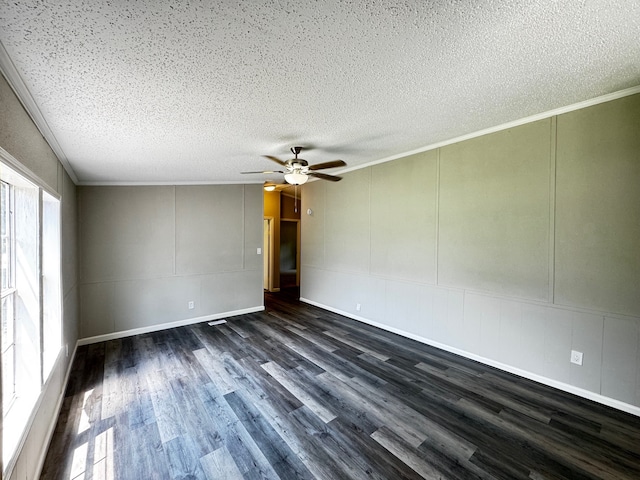 18549 Indigo Way, Porter, TX 77365 - unfurnished room with a decorative wall, dark wood-style flooring, ceiling fan, a textured ceiling, and ornamental molding