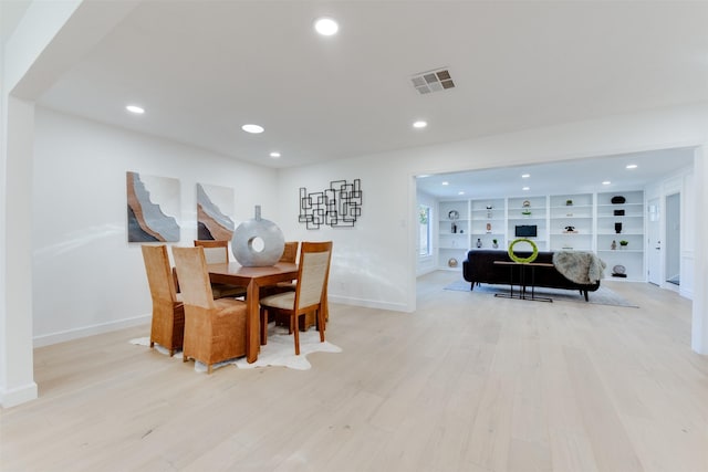 2514 Haverhill Dr, Houston, TX 77008 - dining room with light wood-style flooring, baseboards, and recessed lighting