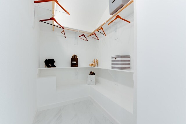 2514 Haverhill Dr, Houston, TX 77008 - walk in closet featuring marble finish floors