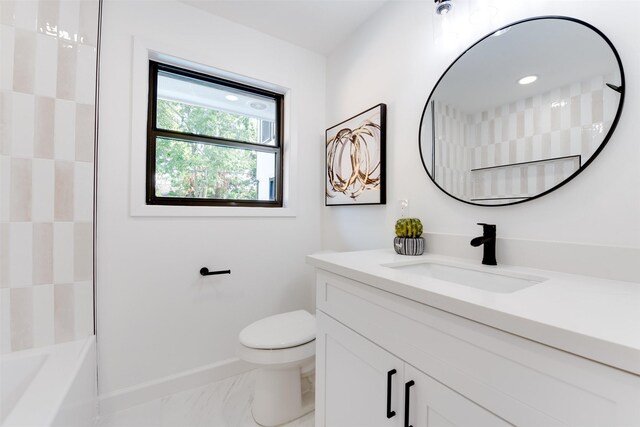 2514 Haverhill Dr, Houston, TX 77008 - full bathroom featuring toilet, vanity, marble finish flooring, and baseboards