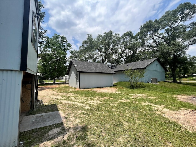 21268 White Oak Dr, Conroe, TX 77306 - view of green lawn with cooling unit