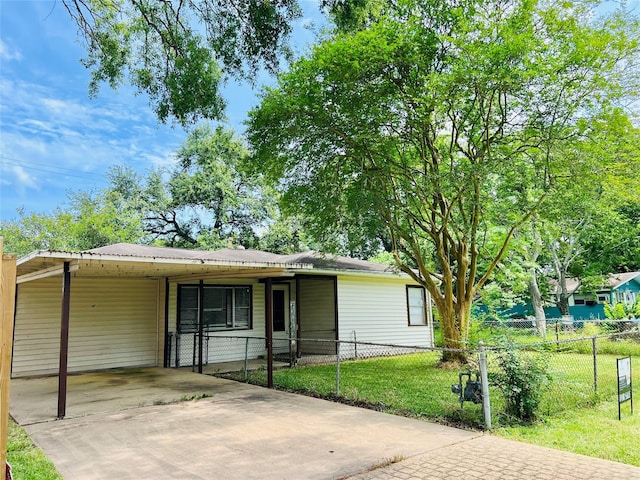 4919 Donald St, Seabrook, TX 77586 - view of front of property featuring concrete driveway and an attached carport