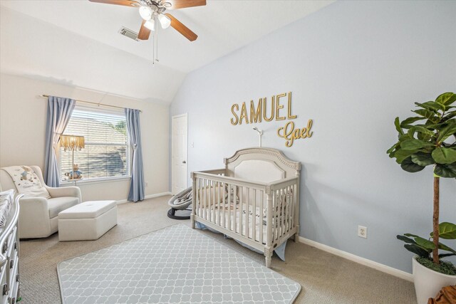 5206 Spring Oak Dr, Pasadena, TX 77505 - carpeted bedroom with vaulted ceiling, baseboards, a nursery area, and ceiling fan