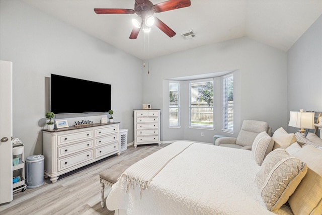 5206 Spring Oak Dr, Pasadena, TX 77505 - bedroom featuring light wood-style floors, lofted ceiling, and ceiling fan